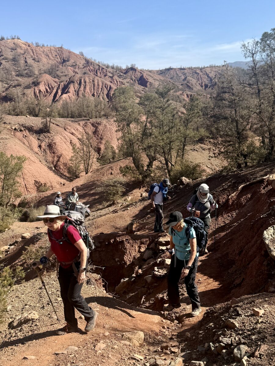 Women hiking in Ourigane Valley on a hiking holiday