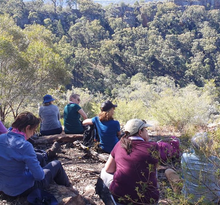 hikers relaxing on the trail